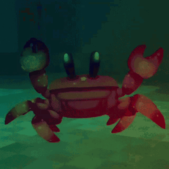 a crab with glowing claws is swimming in the ocean