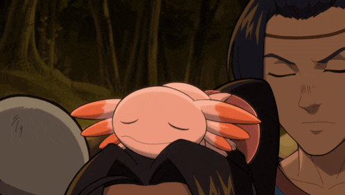 a pink and orange axolotl with its eyes closed