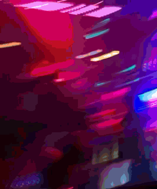a blurry picture of a purple and pink background