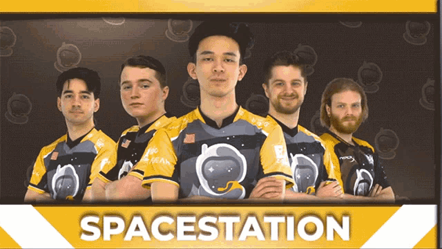 a group of young men standing next to each other with the words spacestation behind them