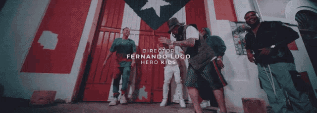 a group of men are standing in front of a flag and the words director fernando lugo horo kids