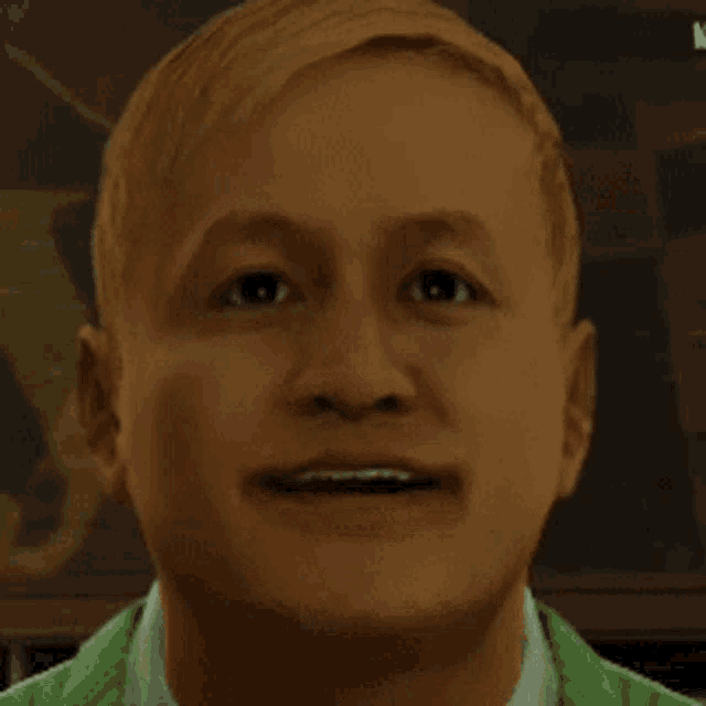 a man with blonde hair is wearing a green jacket and smiling