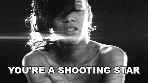a black and white photo of a woman with the words you 're a shooting star above her