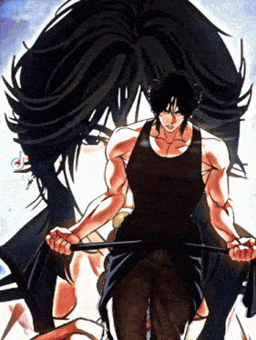 a man in a black tank top is holding a stick in front of a woman 's face
