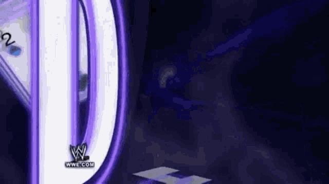 a purple background with a wwe logo on it