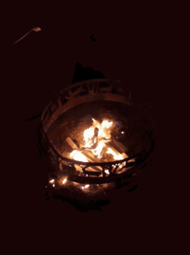 a fire pit with a silhouette of a horse on it