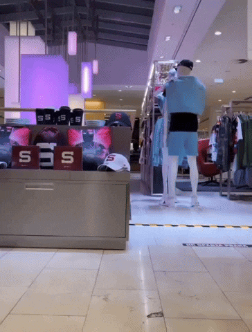 a mannequin in a store with a sign that says ss on it