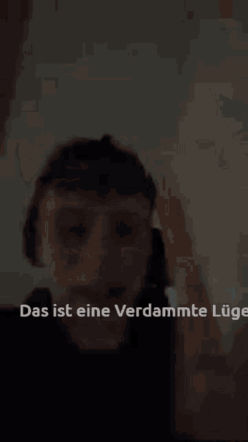 a young man wearing headphones with the words das ist eine verdammte luge written below him
