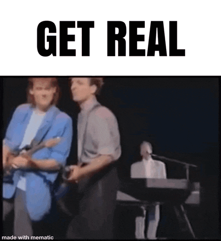 a man is playing a guitar and a man is playing a keyboard on stage .