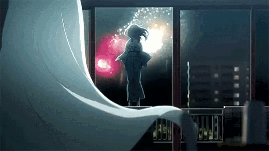 a woman in a kimono stands in front of a window watching fireworks