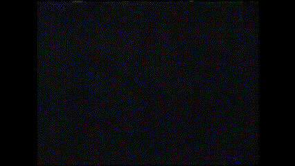 a pattern of red and purple stars with a black background