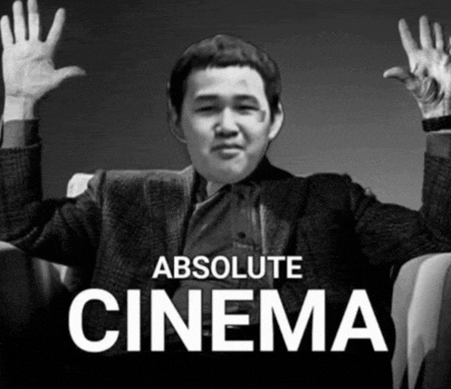a black and white photo of a man with his hands in the air with the words absolute cinema below him