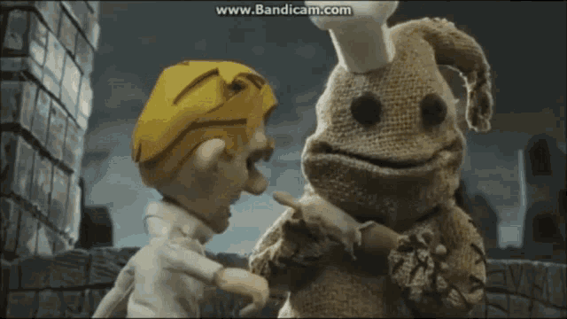 a cartoon character with a chef 's hat on talks to a sack monster