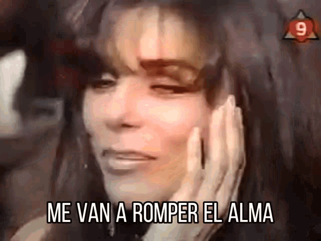 a close up of a woman 's face with the words me van a romper el alma