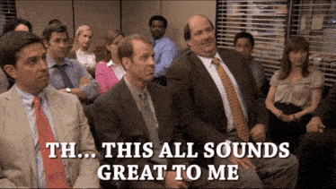 a group of people are sitting in a room with the words th this all sounds great to me