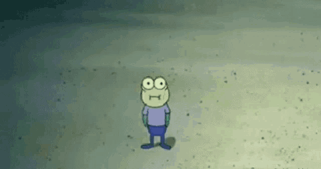 a cartoon character from spongebob squarepants is standing on a beach .