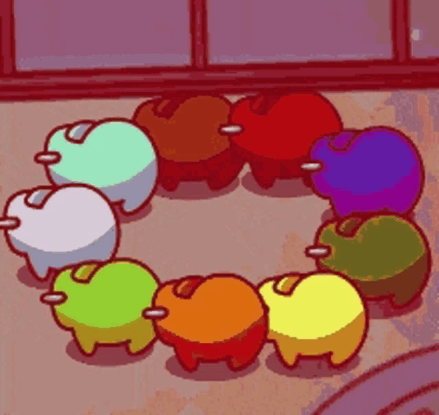 a bunch of colorful apples are in a circle
