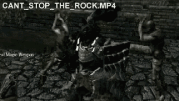 a statue of a man is being destroyed by a rock .