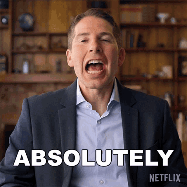 a man with his mouth open and the word absolutely on the bottom right