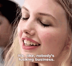 a woman is smiling and saying it 's like nobody 's fucking business