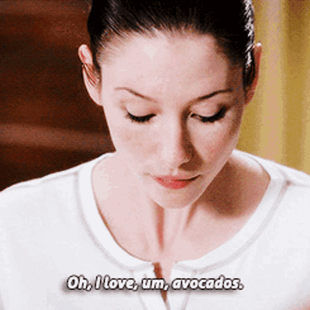 a woman says " oh i love um avocados " while looking down