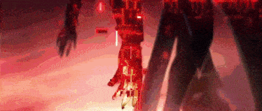a close up of a person 's arm with red lights coming out of it .