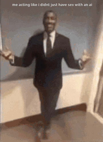 a man in a suit and tie is standing with his arms outstretched