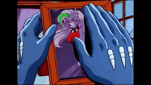 a picture of a cartoon character is being held by two hands