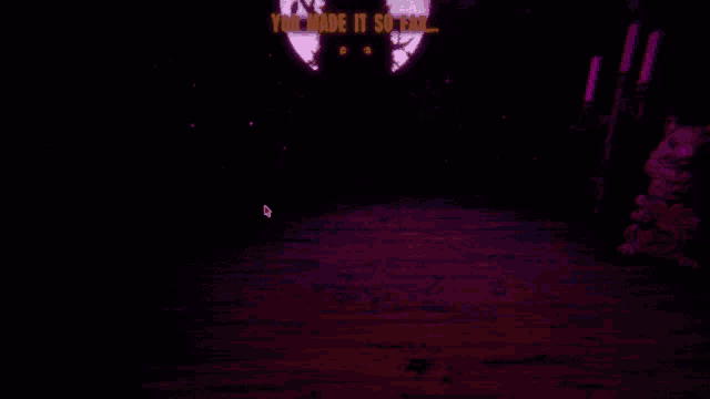 a person 's hands are reaching out in a dark room with a full moon behind them