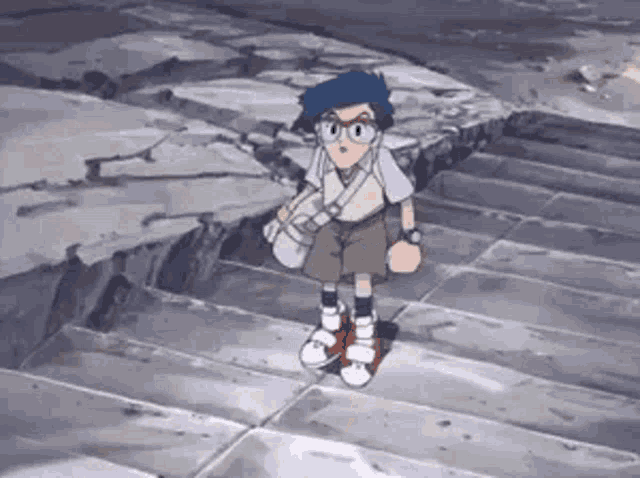 a young boy is standing on a set of stairs with a bag on his shoulder .