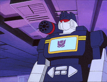 a robot with a purple and yellow emblem on it 's chest