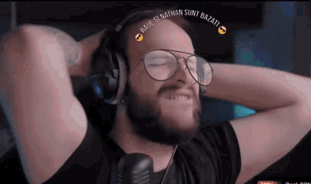 a man wearing glasses and headphones with the name raul si nathan sunt bazati on his forehead