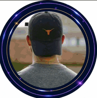 a man wearing a hat with a bull on it is in a purple circle
