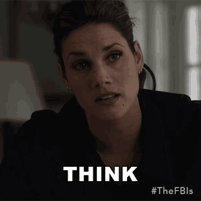 a woman says " think " in white letters