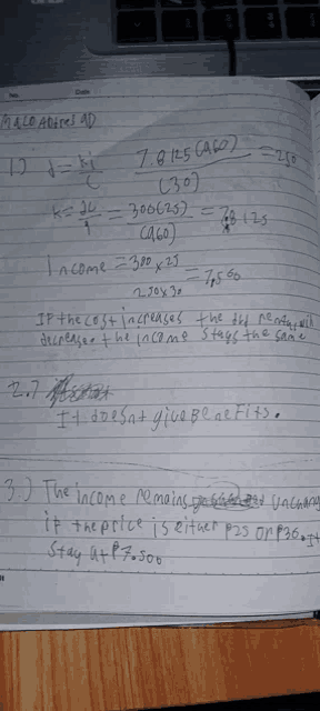a notebook is open to a page that says ' income = 380 x 23 ' on it