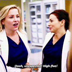 two female doctors are talking and one of them says oooh unexpected high-five