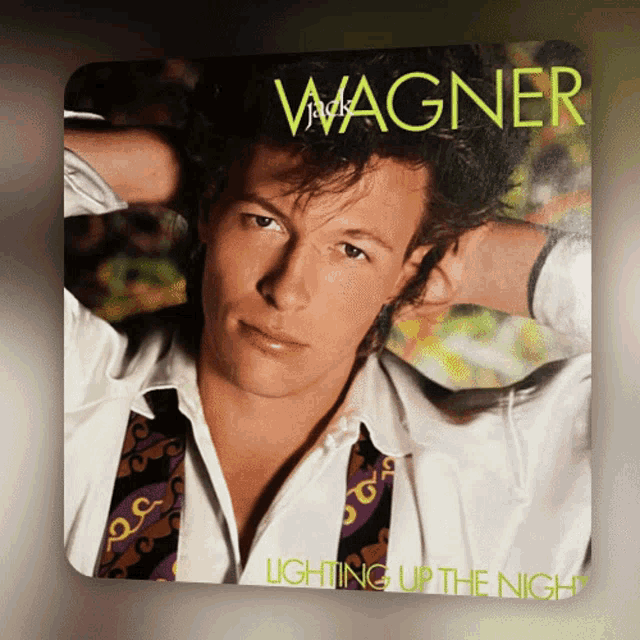 a jack wagner album cover shows a man with his arms crossed