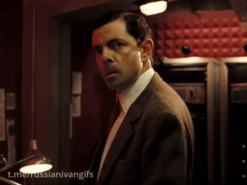 a man with a surprised look on his face has a t.me/russianivangifs watermark below him