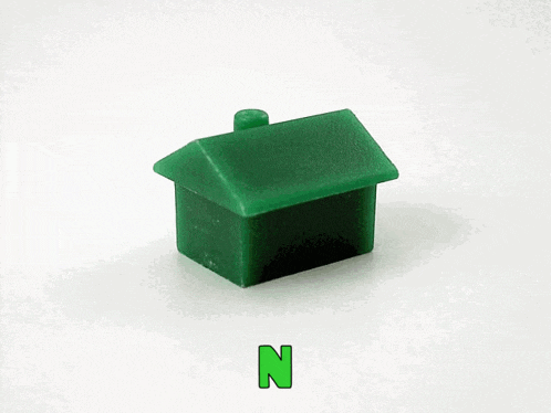 a green toy house with the words " noticeable lack of " below it