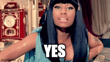 a woman with long black hair says yes in front of a red clock