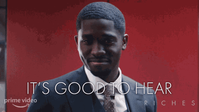 a man in a suit and tie with the words it 's good to hear riches above him