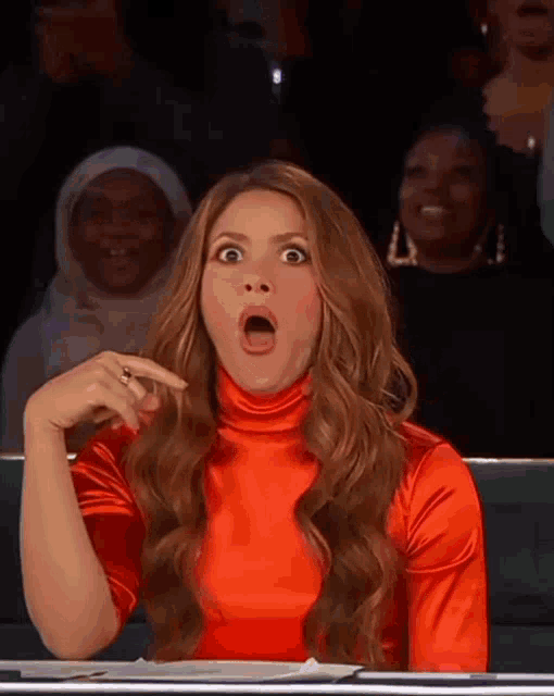 a woman with a surprised look on her face