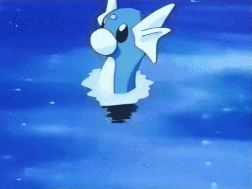 a blue and white cartoon character is flying in the air .