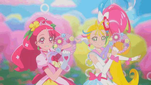 a group of girls are standing in a field with bubbles in the background