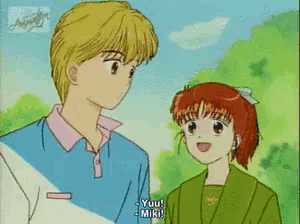a boy and a girl are standing next to each other with the girl saying " yuu "
