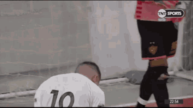a soccer player with the number 10 on their jersey