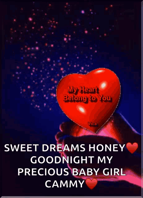a hand holding a red heart that says " my heart belong to you "