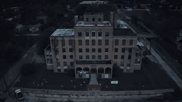 an aerial view of a building with the word destination written on it