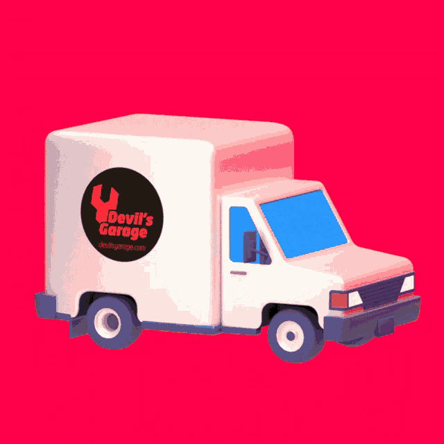 a white truck with devil 's garage on the side