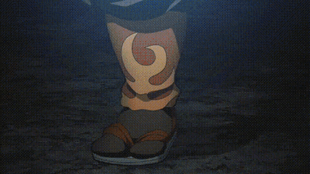 a pixelated image of a person 's foot in a dark room